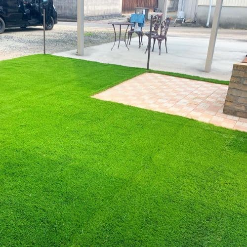 Artificial grass installation in a Sharjah villa garden UAE