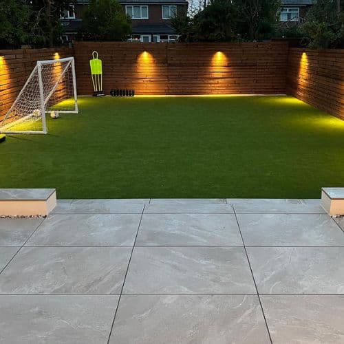 Artificial grass installation in a Dubai villa garden