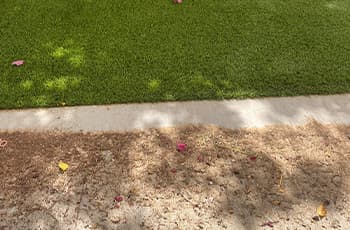 Brushing artificial grass along the pile direction