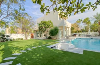 Family garden with artificial grass and pool area